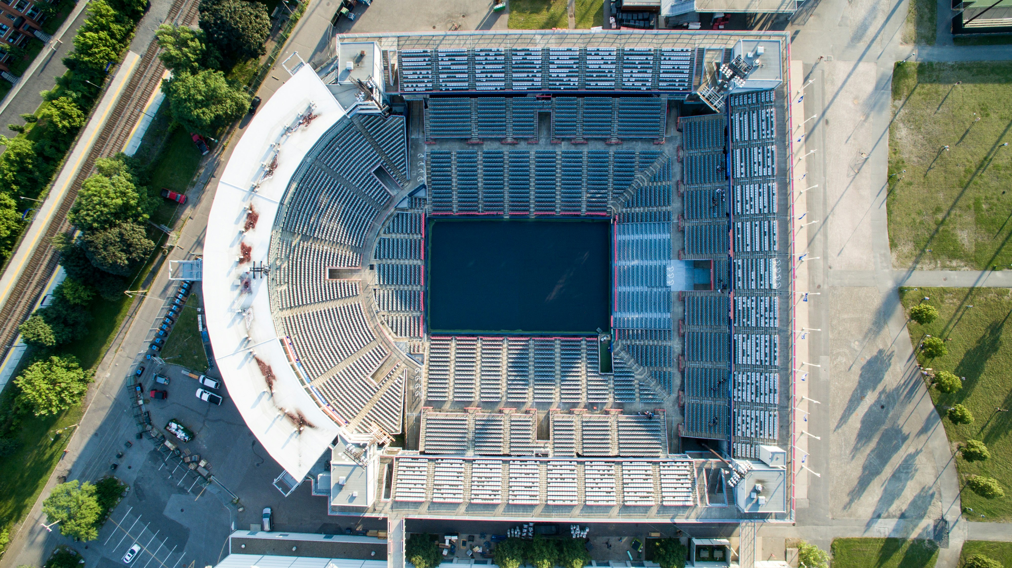 aerial photography of grey concrete stadium